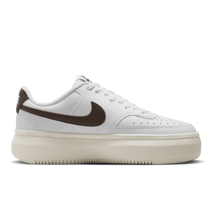 white and tan nike shoes